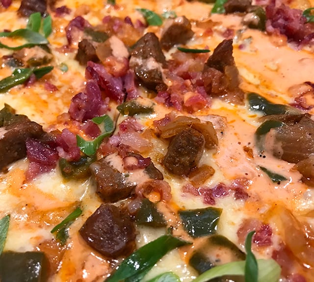 Spicy Creole Sausage Pizza.
